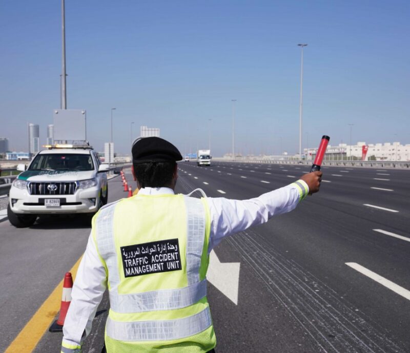UAE authorities at work, handling traffic violations and black points.